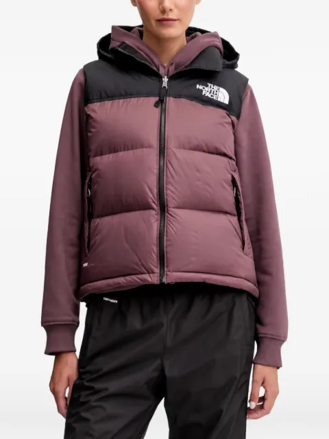 The North Face chaleco con capucha y diseño de dos tonos