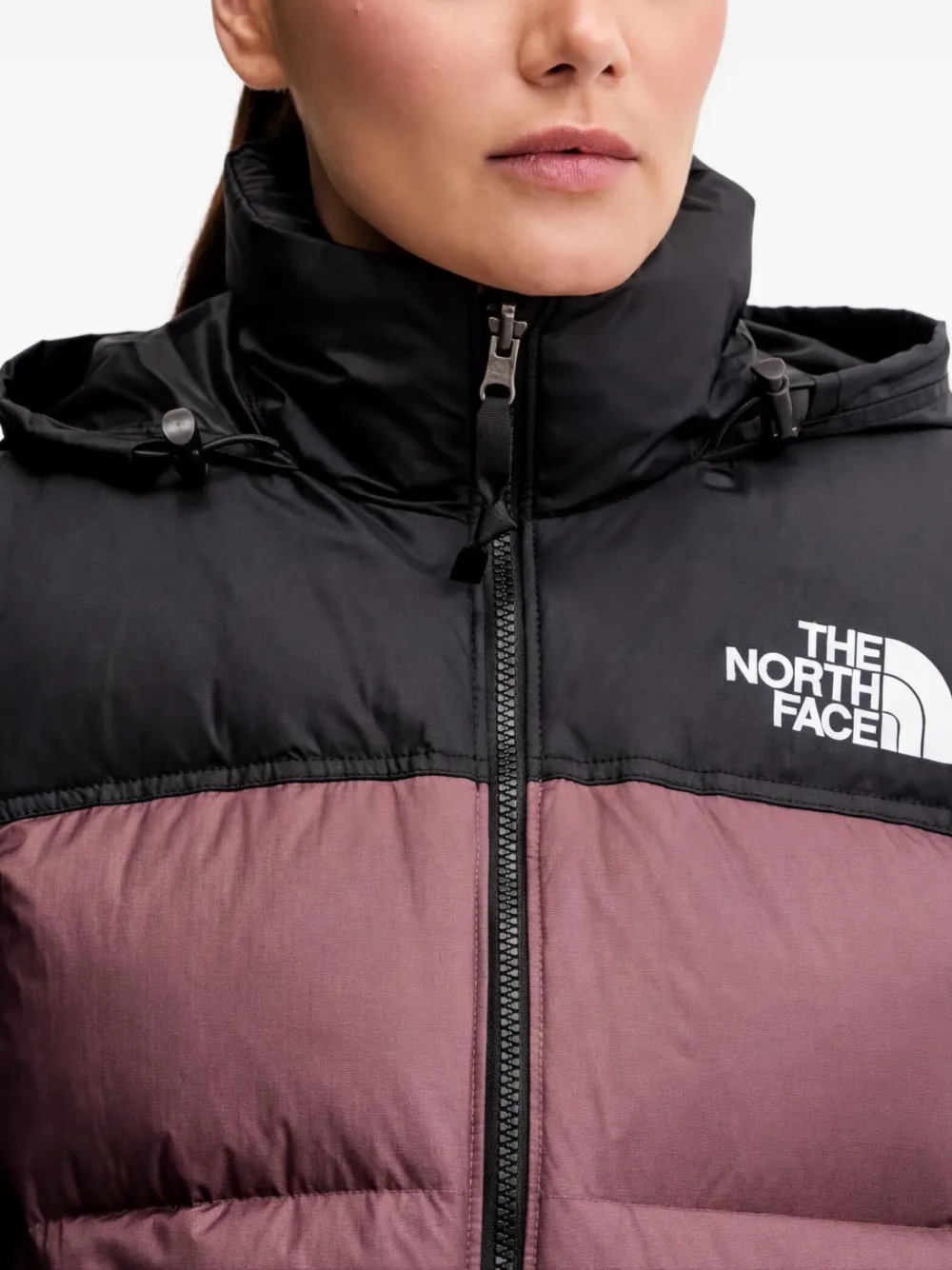 The North Face Tweekleurige bodywarmer met capuchon Paars