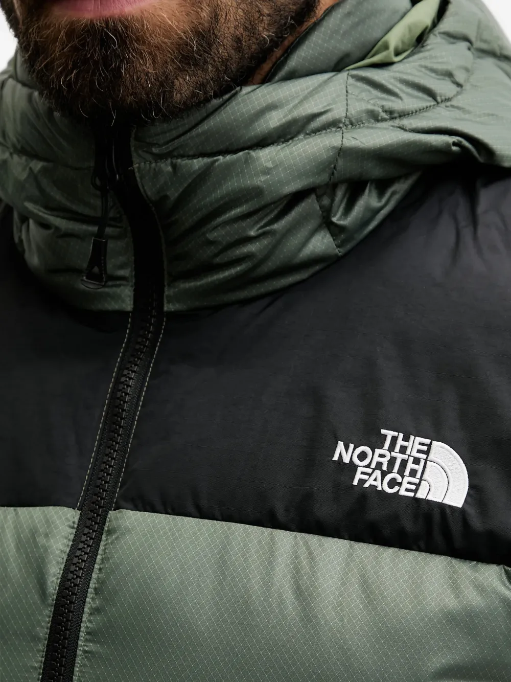 The North Face Gewatteerd jack met capuchon Groen