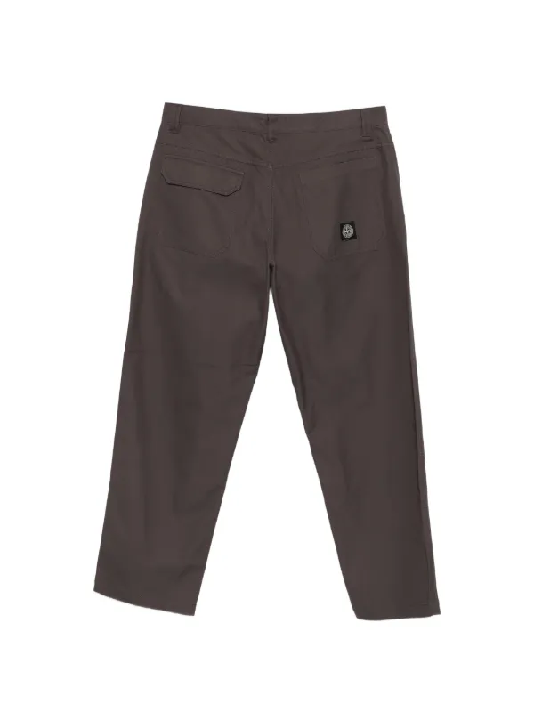 Stone Island ロゴパッチ パンツ | グレー | FARFETCH JP