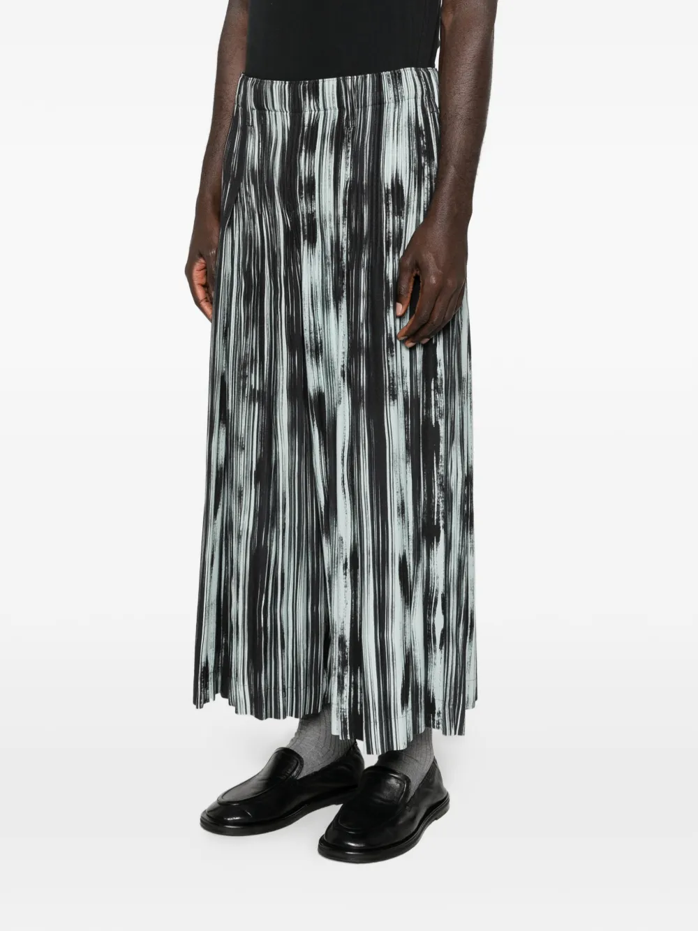 Homme Plissé Issey Miyake Gestreepte plooibroek Zwart