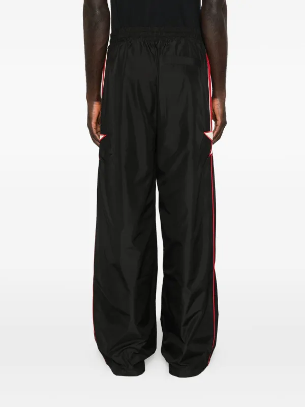 AMIRI Star Panelled Track Pants | Black | FARFETCH