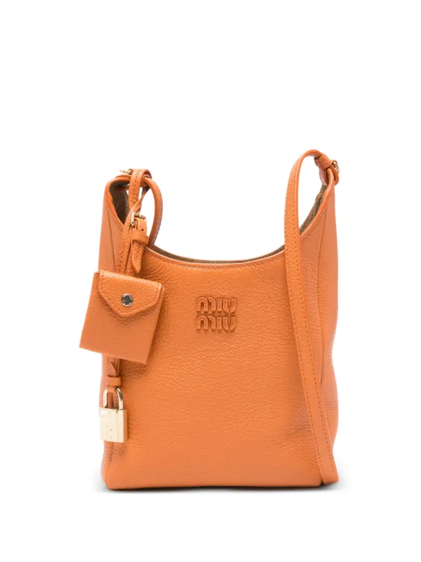 Miu Miu padlock-charm Leather Cross Body Bag | Orange | FARFETCH BE