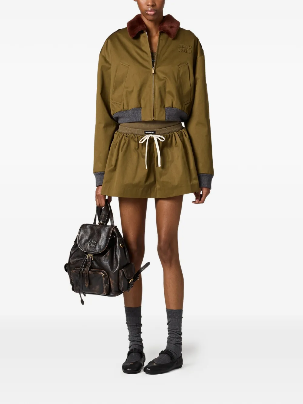 Miu Miu logo-detail flared mini skirt - Groen