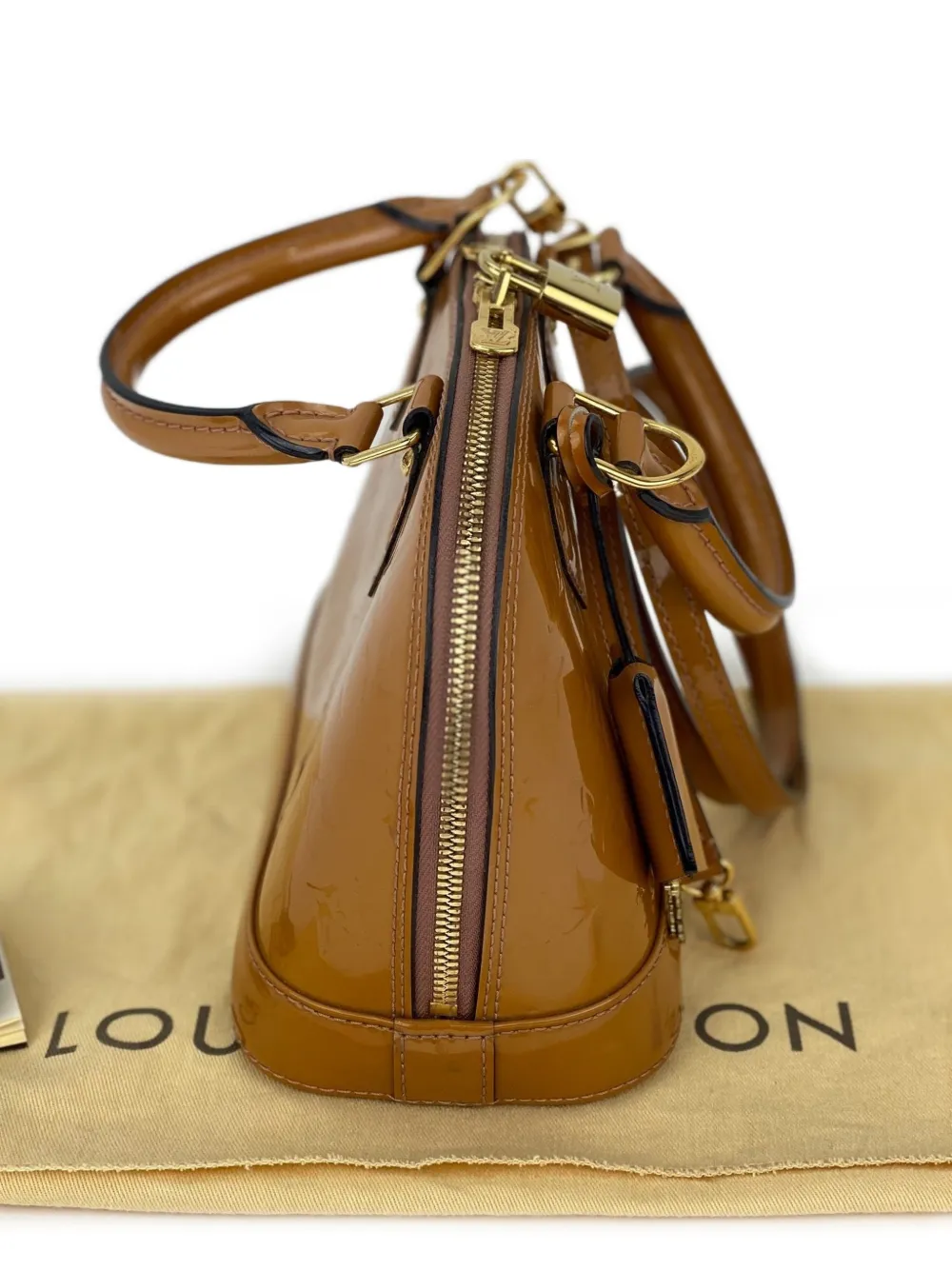 Monogram Vernis Alma Shoulder Bag