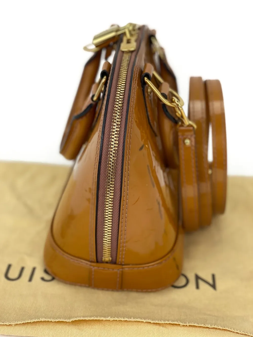 Monogram Vernis Alma Shoulder Bag