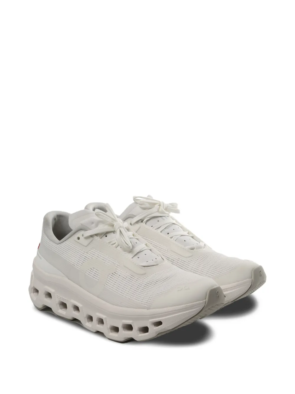 On Running Cloudmonster Void geperforeerde sneakers Wit