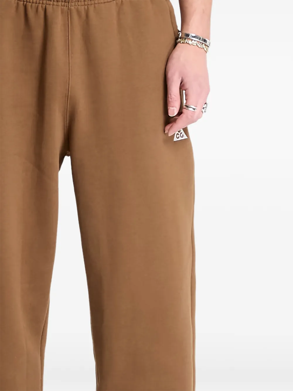 Nike Elastische broek met logo Bruin
