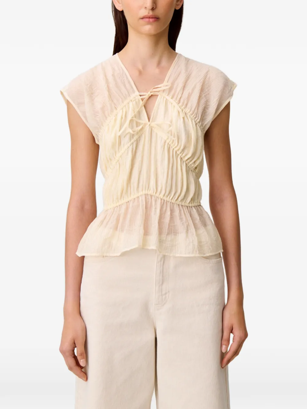 Claudie Pierlot Gesmockte blouse met strikdetail Beige