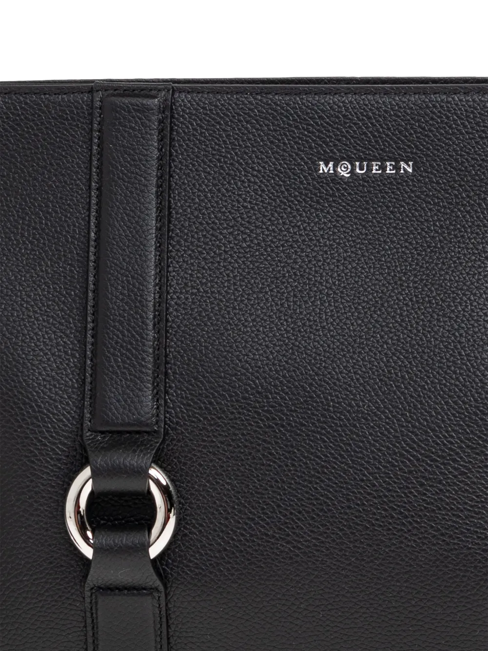 ring-detail clutch bag