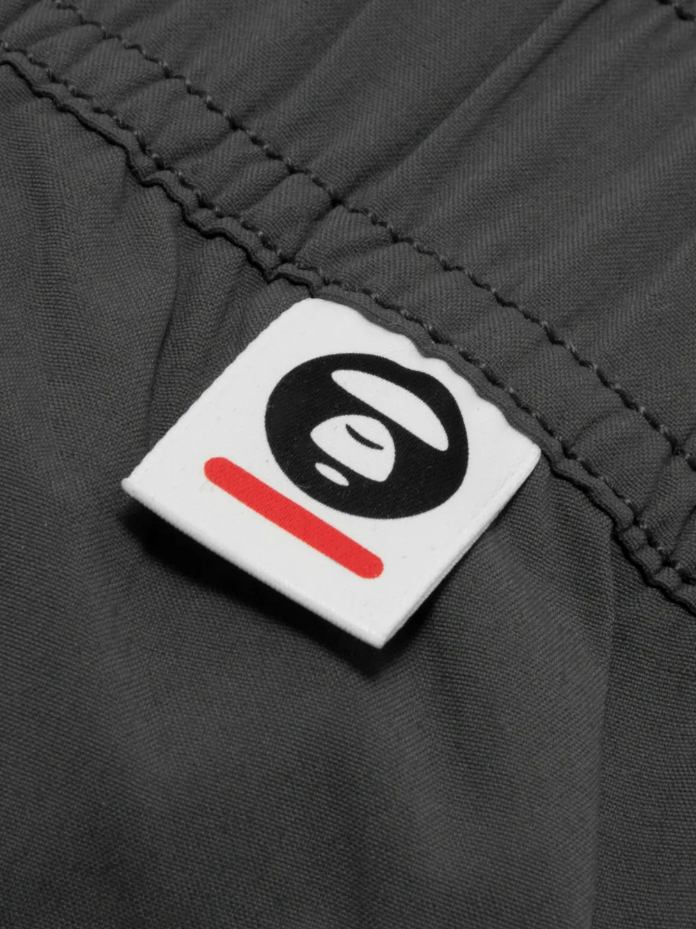 AAPE BY *A BATHING APE Trainingsbroek met logo Grijs