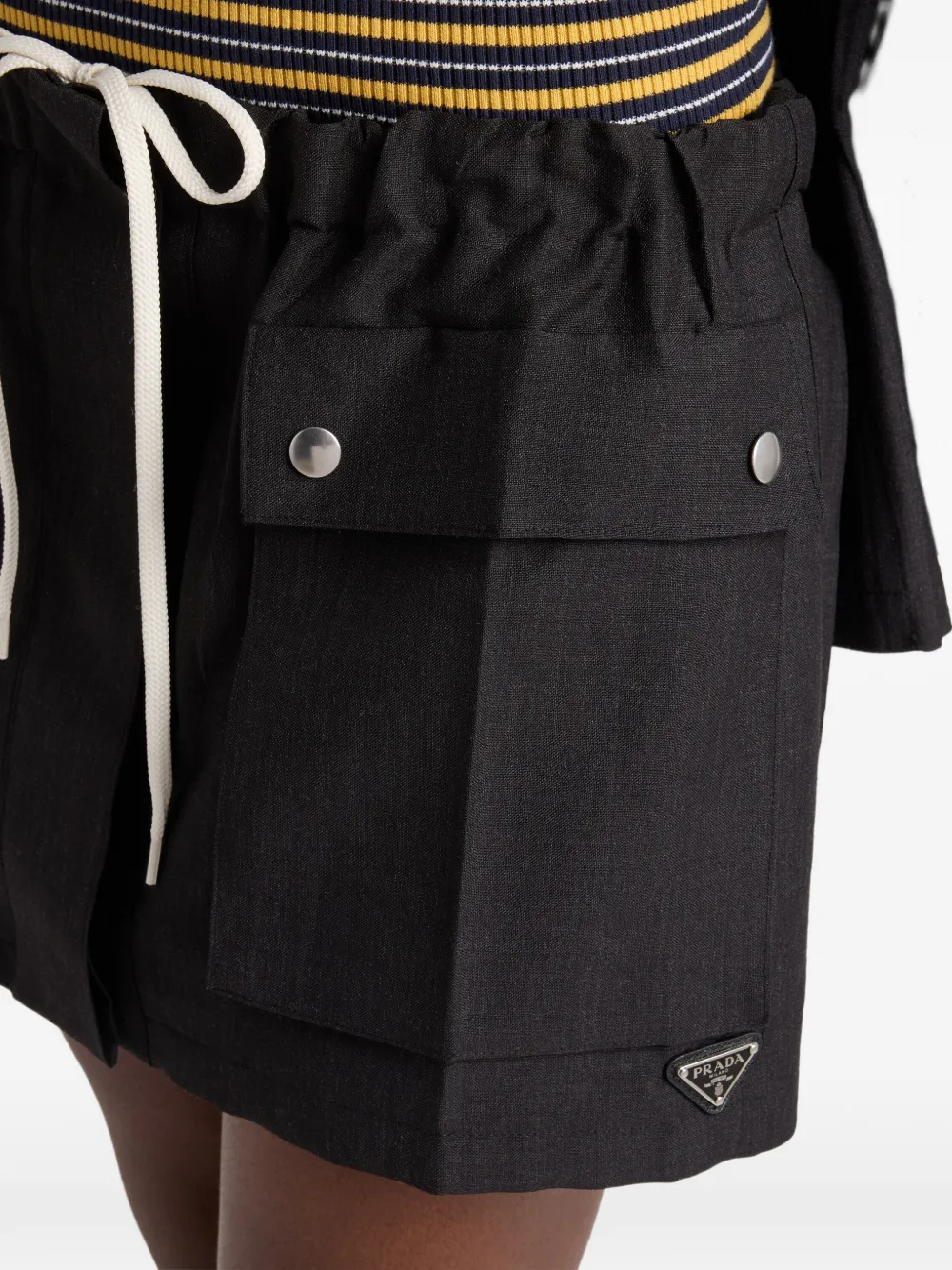 flap-pocket drawstring mini skirt