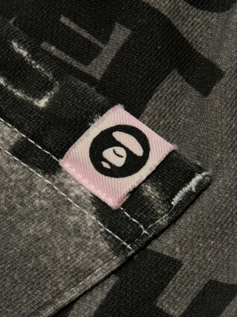 AAPE BY *A BATHING APE Trainingsbroek met grafische print Grijs