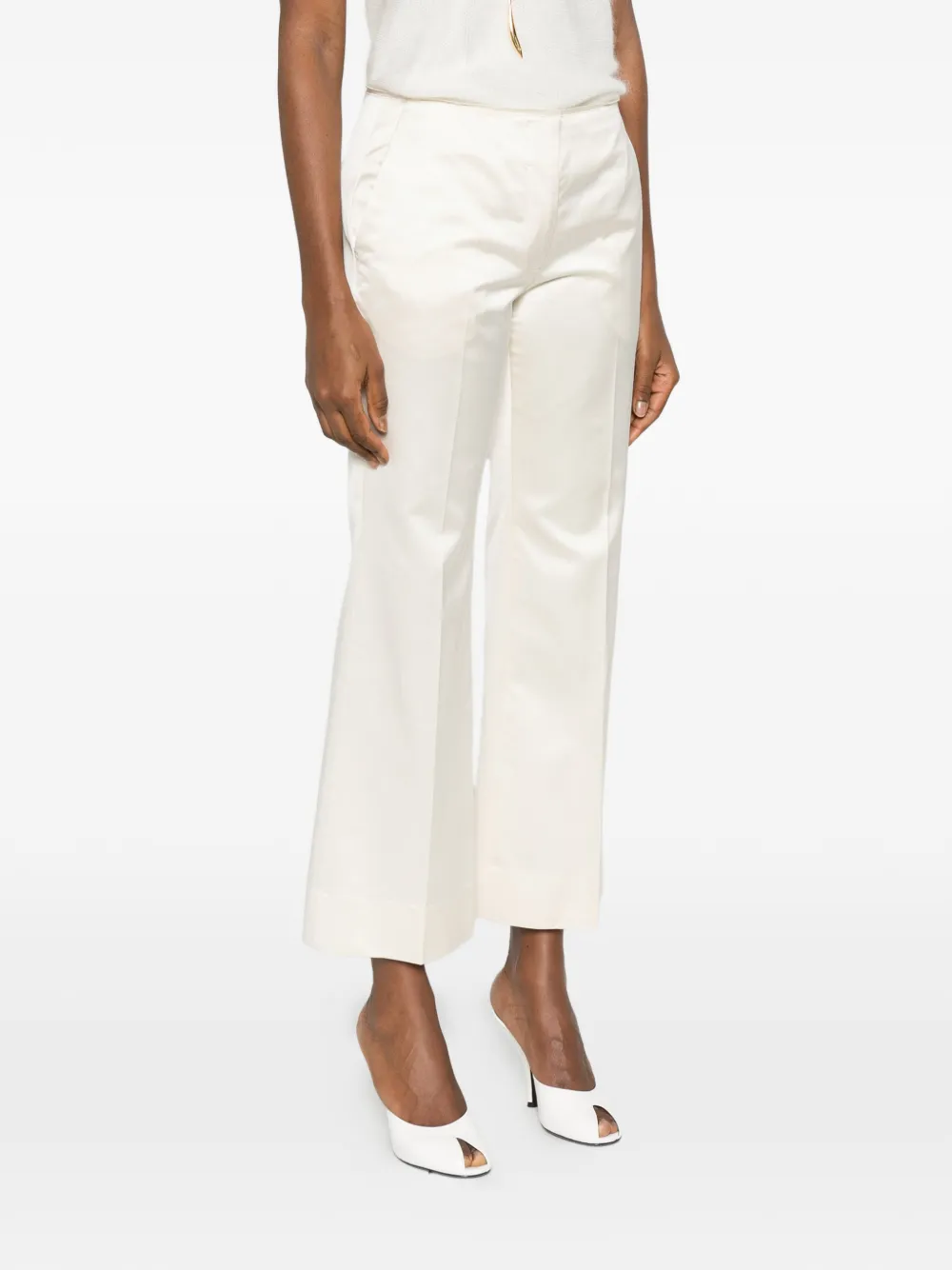 TOTEME Kick flare broek met gerafelde afwerking Beige