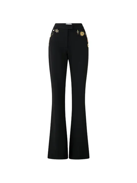 Camilla pantalones acampanados con tiro medio