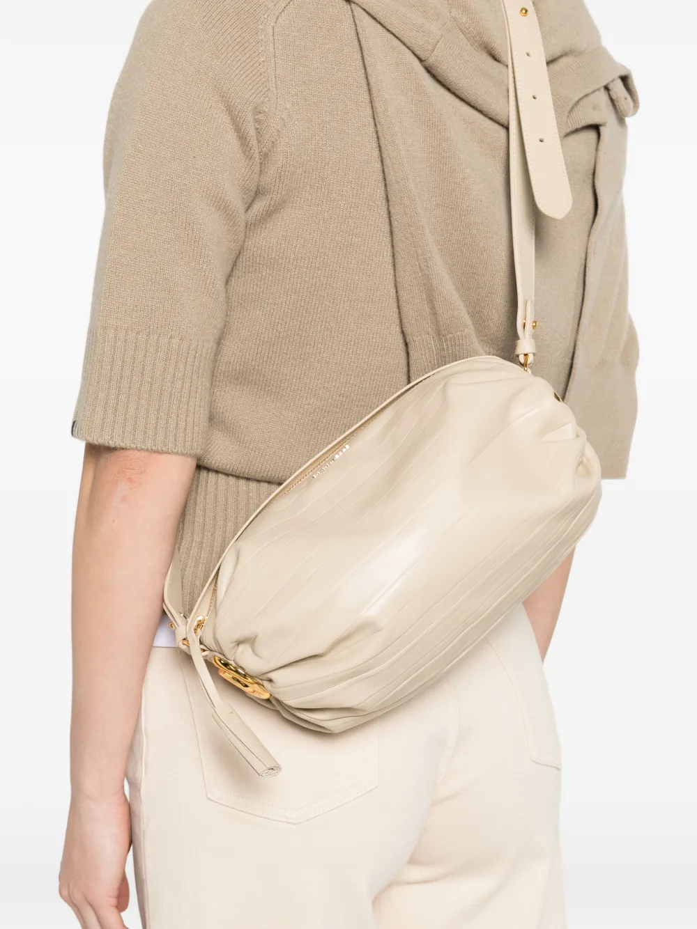 Coccinelle Schoudertas met kwastje Beige
