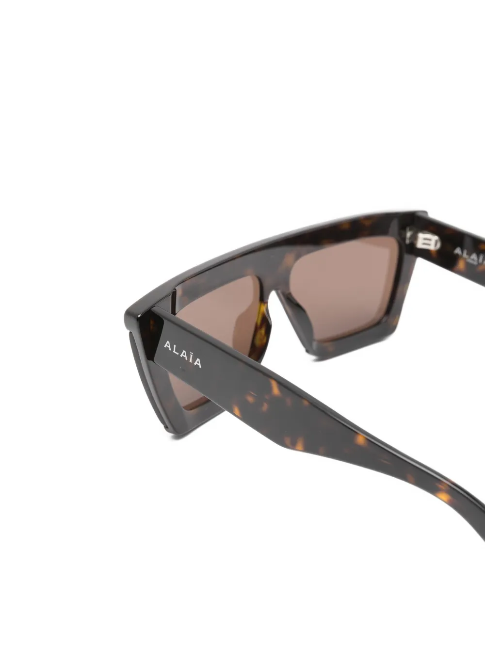 Alaia Eyewear Zonnebril met geometrisch montuur Bruin