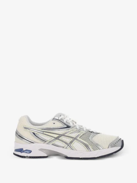 ASICS tenis con detalle plateado
