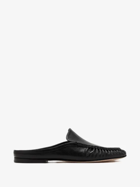 Vince Tevin gathered mules