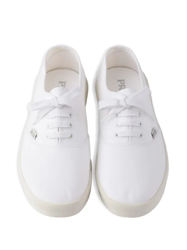 Prada logo-patch lace-up Sneakers | White | FARFETCH