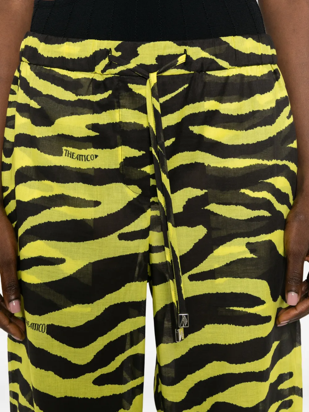 The Attico Broek met zebraprint en trekkoord Geel