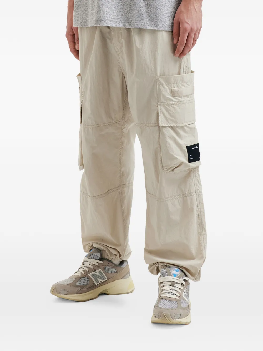 izzue Broek met cargo zak Beige
