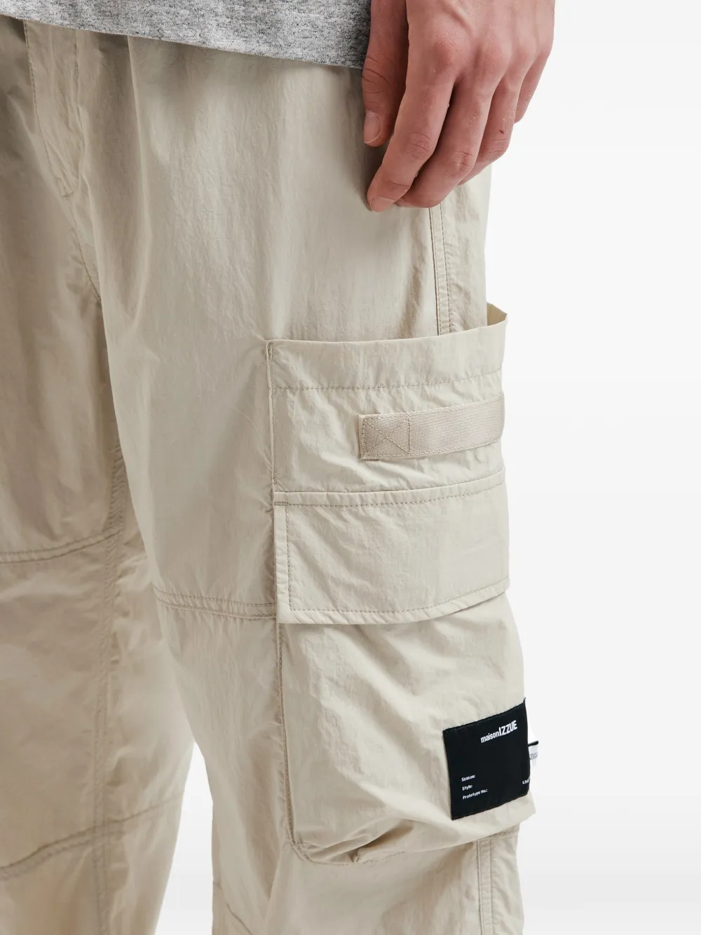 izzue Broek met cargo zak Beige
