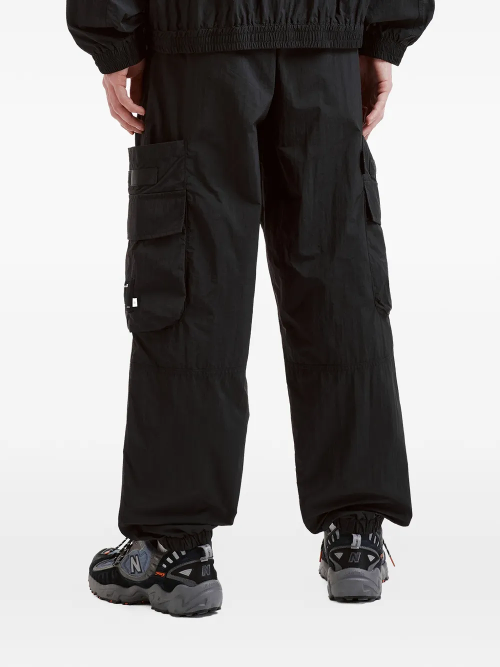 izzue Broek met cargo zak Zwart