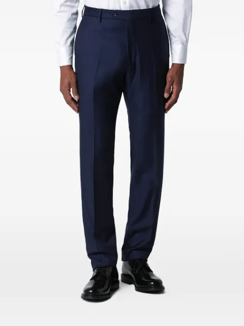 Tagliatore traje con botones