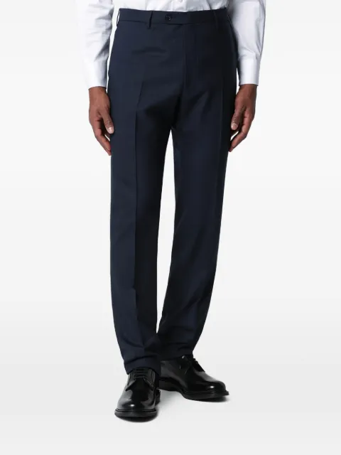 Tagliatore traje con botones