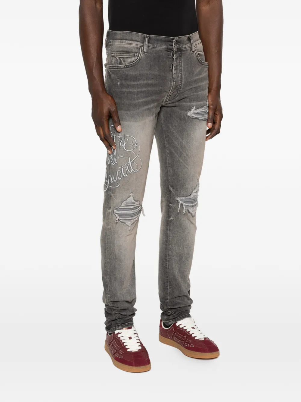 AMIRI Gerafelde jeans met borduurwerk Grijs