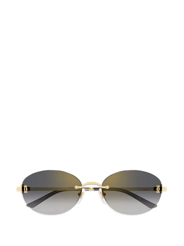 Cartier Eyewear Oval Rimless Sunglasses in Gold