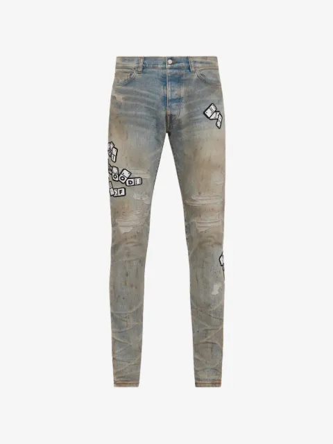 AMIRI Calça jeans skinny com aplicação