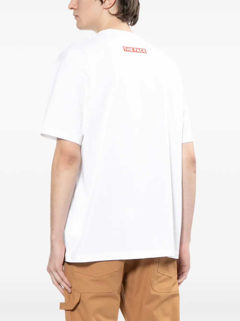 Junya Watanabe MAN T-shirt met grafische print Beige