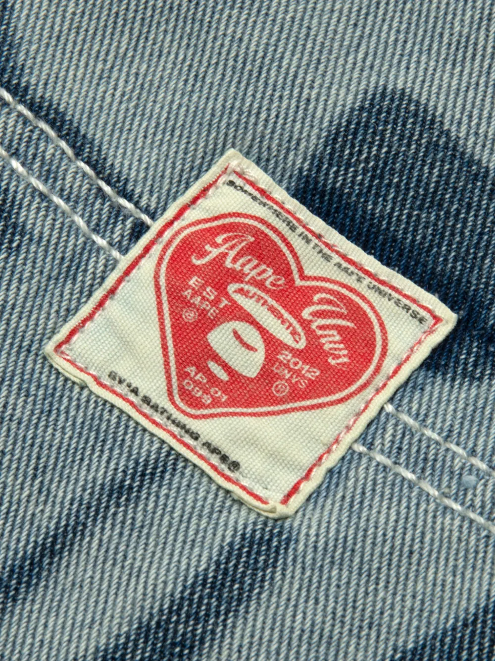 AAPE BY *A BATHING APE Aapeunvs grafische jeans Blauw