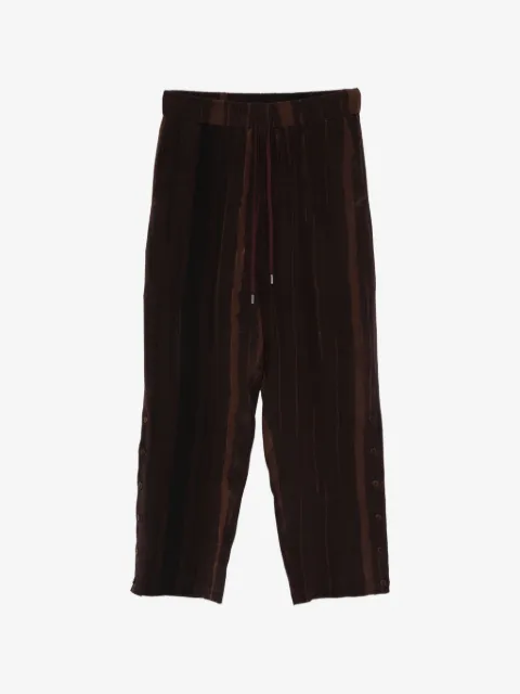 Costumein elastic-waistband trousers