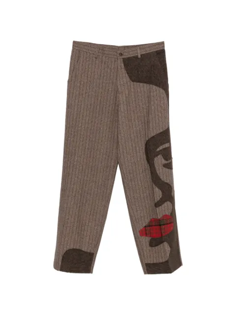 KidSuper pantalones con estampado de rayas diplomáticas 