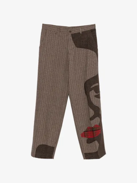 KidSuper pinstripe face-patchwork trousers
