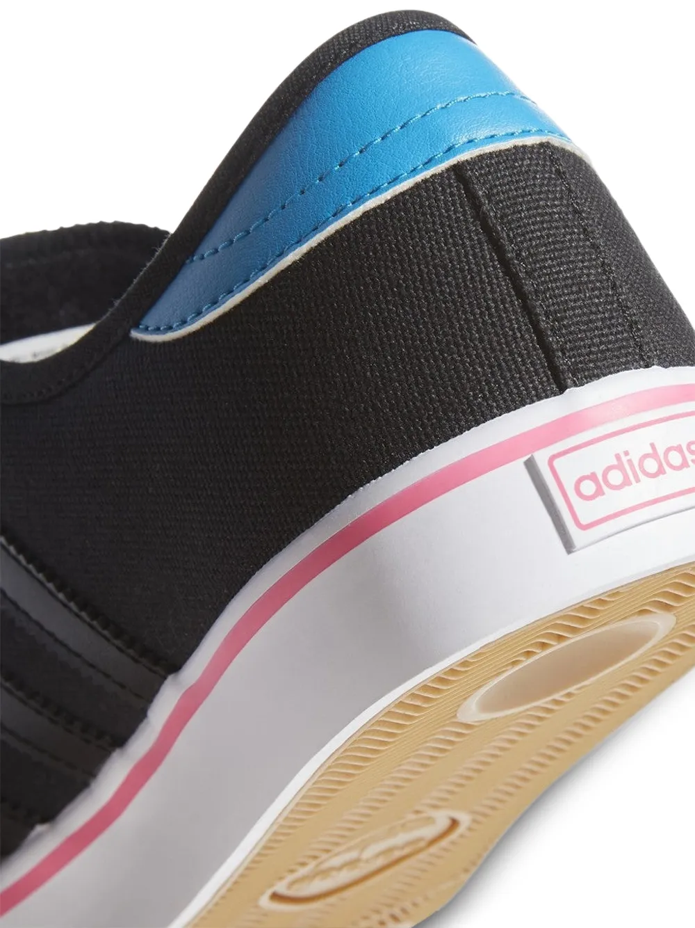 adidas Seeley gestreepte sneakers Zwart