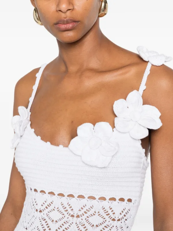 retrofete white mini dress Regina Shell the seductive silhouette is finished with a button closure at the neck and an invisible zipper closure down the body Taylor Swift Steps Out in