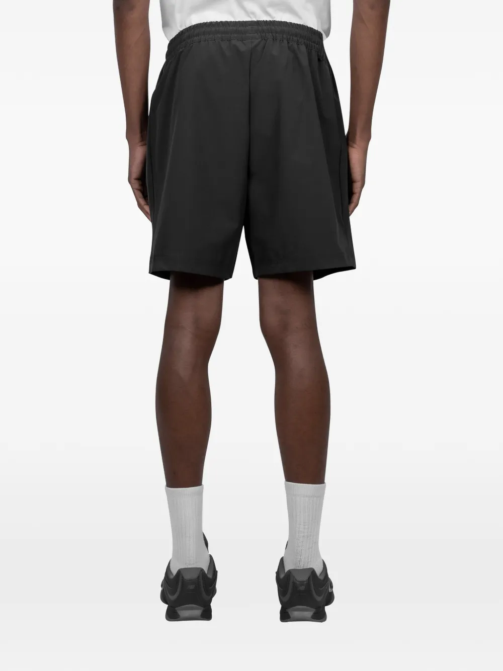 New Balance Elastische shorts Zwart