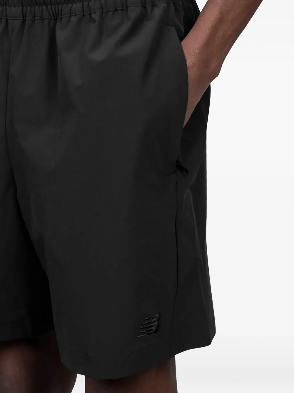 New Balance Elastische shorts Zwart