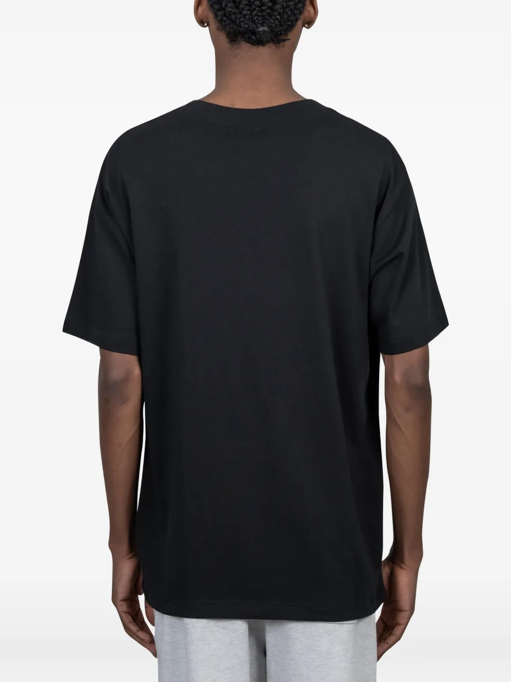 New Balance T-shirt met grafische print Zwart