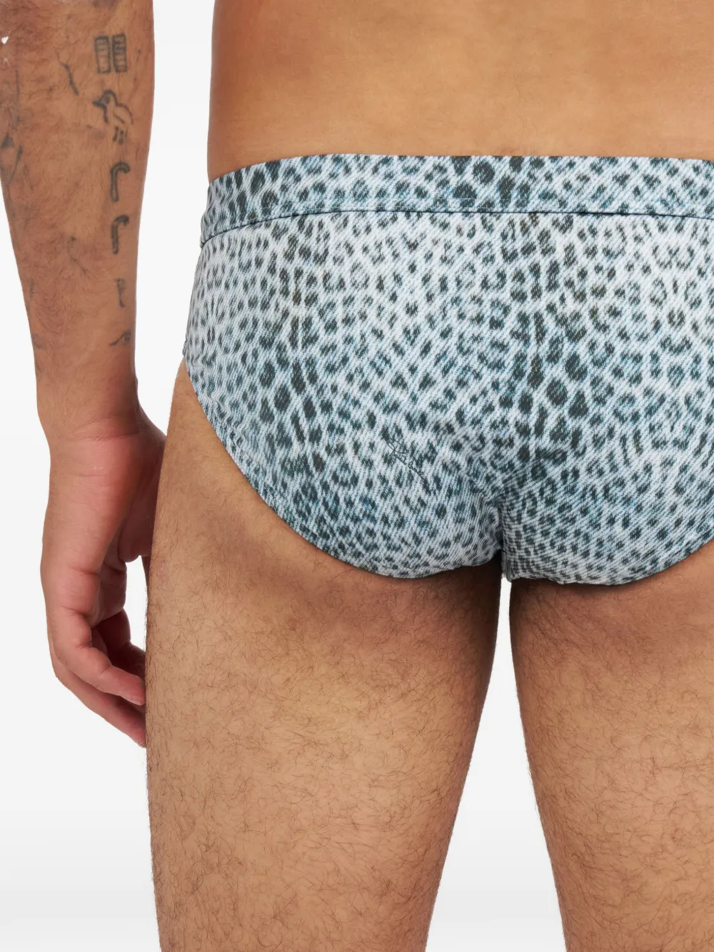 animal-print swim trunks