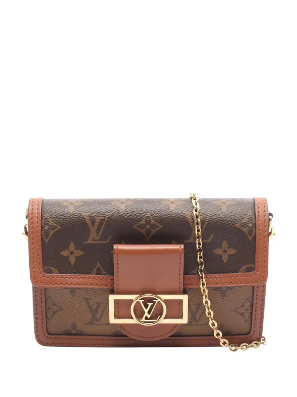 Louis Vuitton Pre-owned 2019 Monogram Reverse Dauphine Chain Wallet Crossbody Bag in Brown