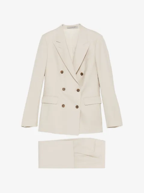 Tagliatore traje con doble botonadura