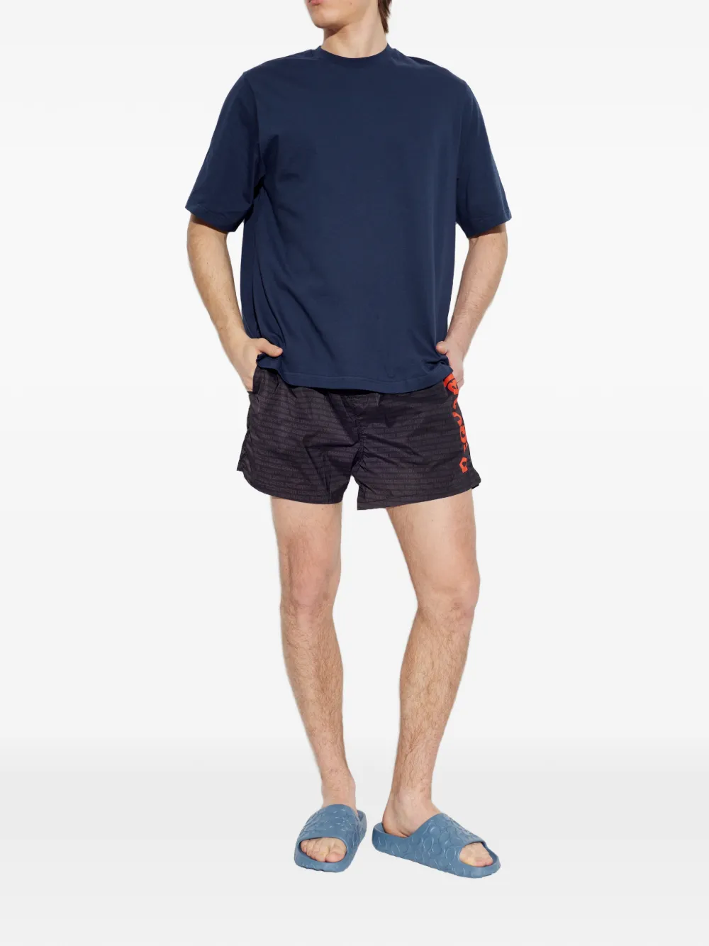 Coach Bay slippers met logo-reliëf Blauw