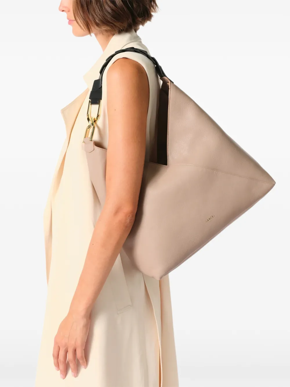 Lancel Schoudertas met gevlochten handvat Beige