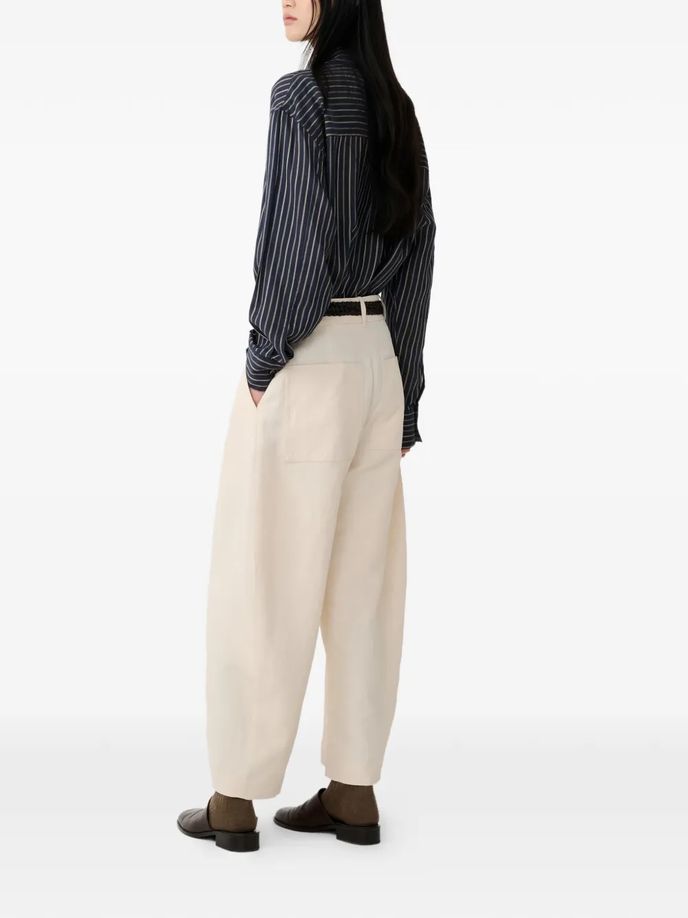Studio Nicholson Chalco gewelfde jeans Beige