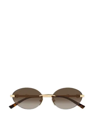 Gucci キャットアイサングラス ゴールドロゴ Gucci Eyewear キャットアイ サングラス | ゴールドトーン | FARFETCH JP